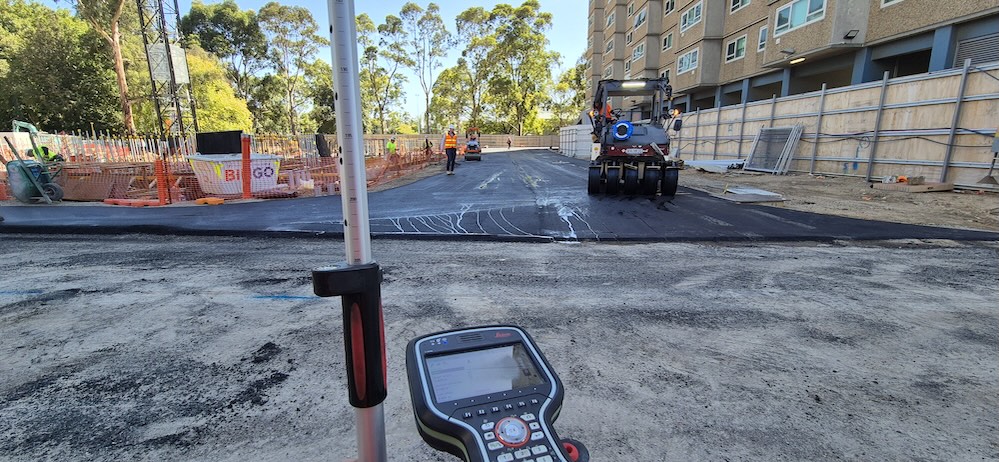Construction survey in Melbourne with topographic and level survey equipment during road and civil infrastructure works